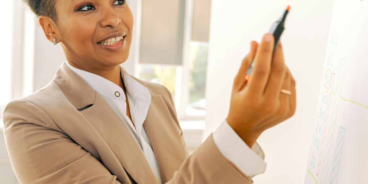 A business professional confidently addressing a complex problem, showcasing effective decision-making skills in the workplace.