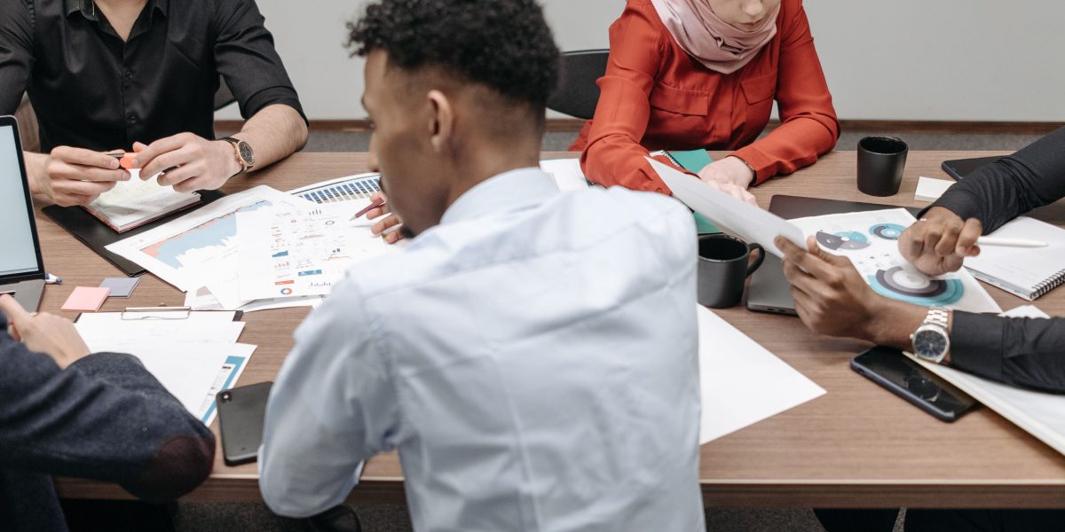 Professionals from different fields collaborating, applying critical thinking to diverse challenges.