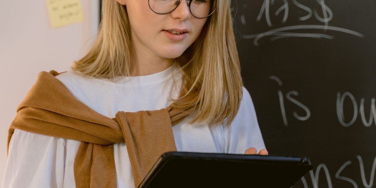A person using technology for research, demonstrating thoughtful engagement with digital tools.