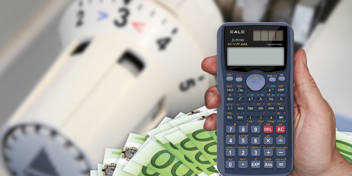 A person carefully reviewing financial documents and planning their budget to understand the true cost and ROI of their education.