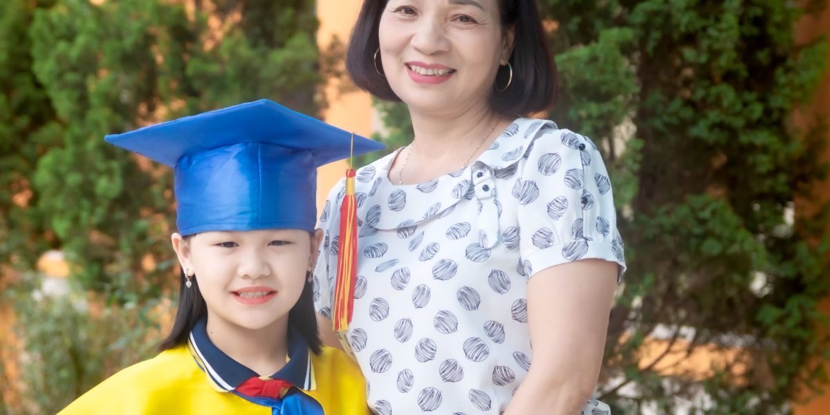 Parents beam with pride as their child celebrates a significant academic achievement.